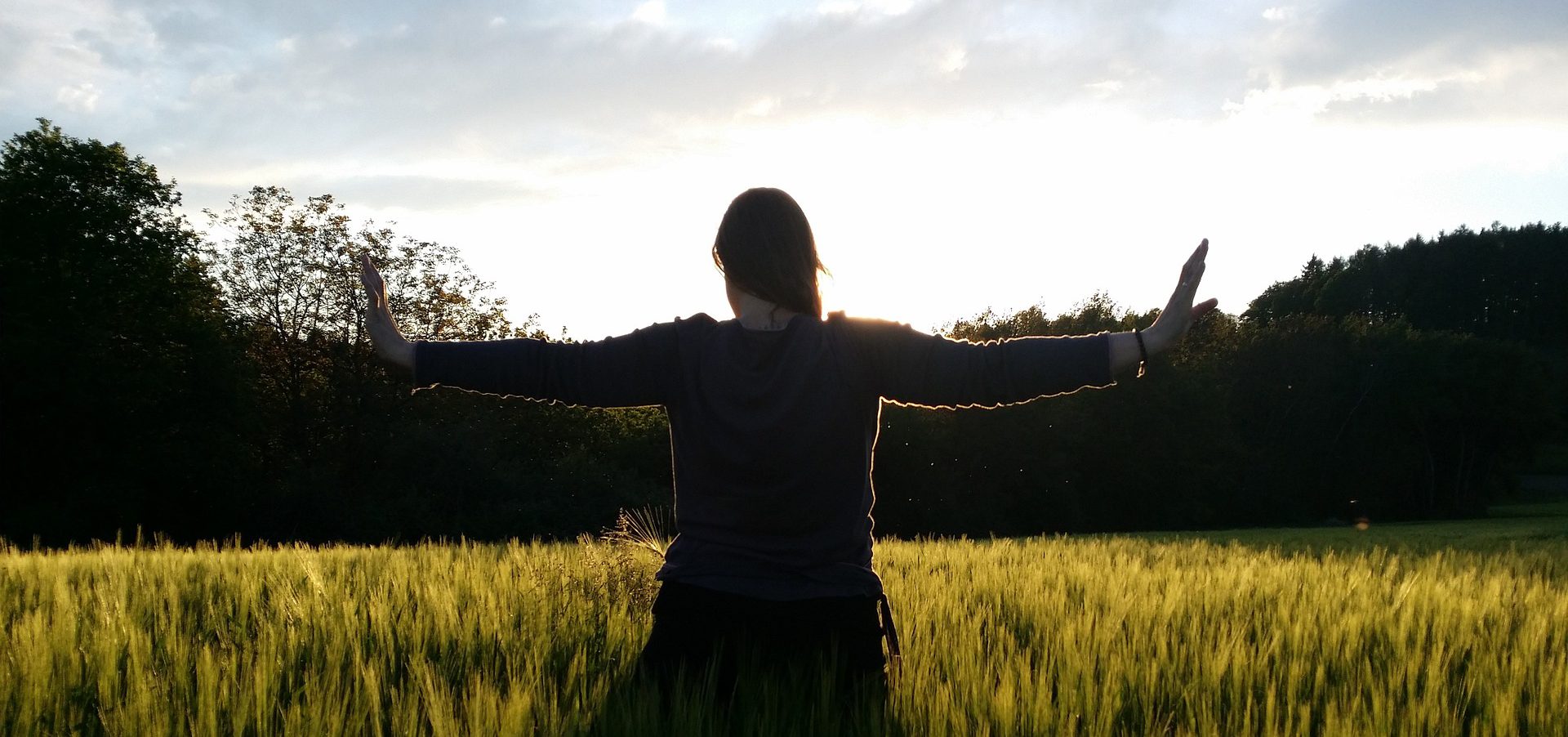 Woman Energizing in Field