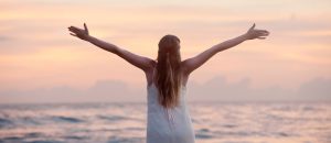 woman outstretching arms