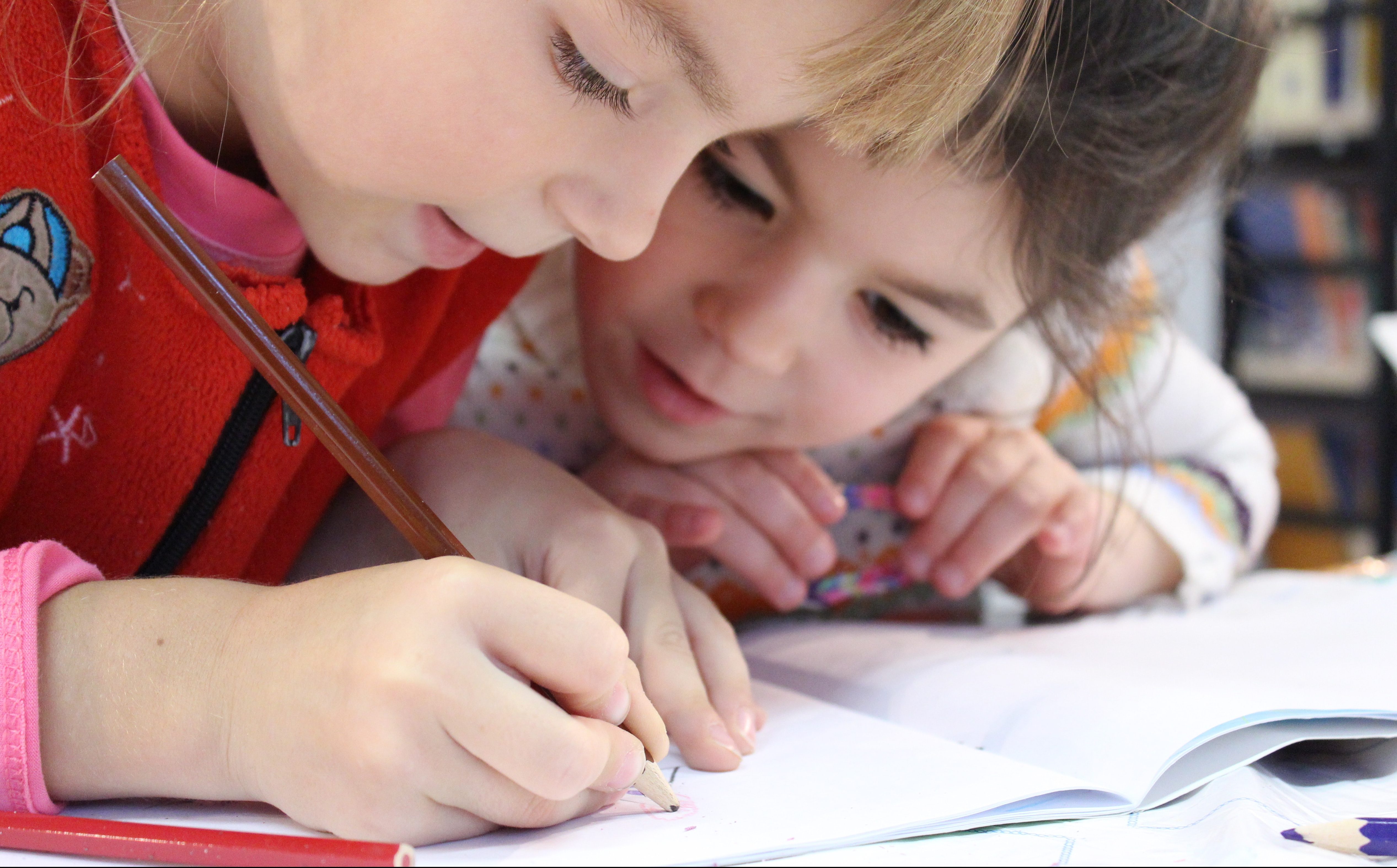 two children drawing