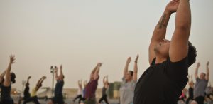 men doing yoga