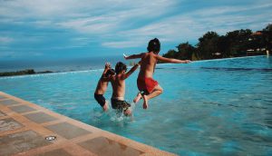 jumping into pool