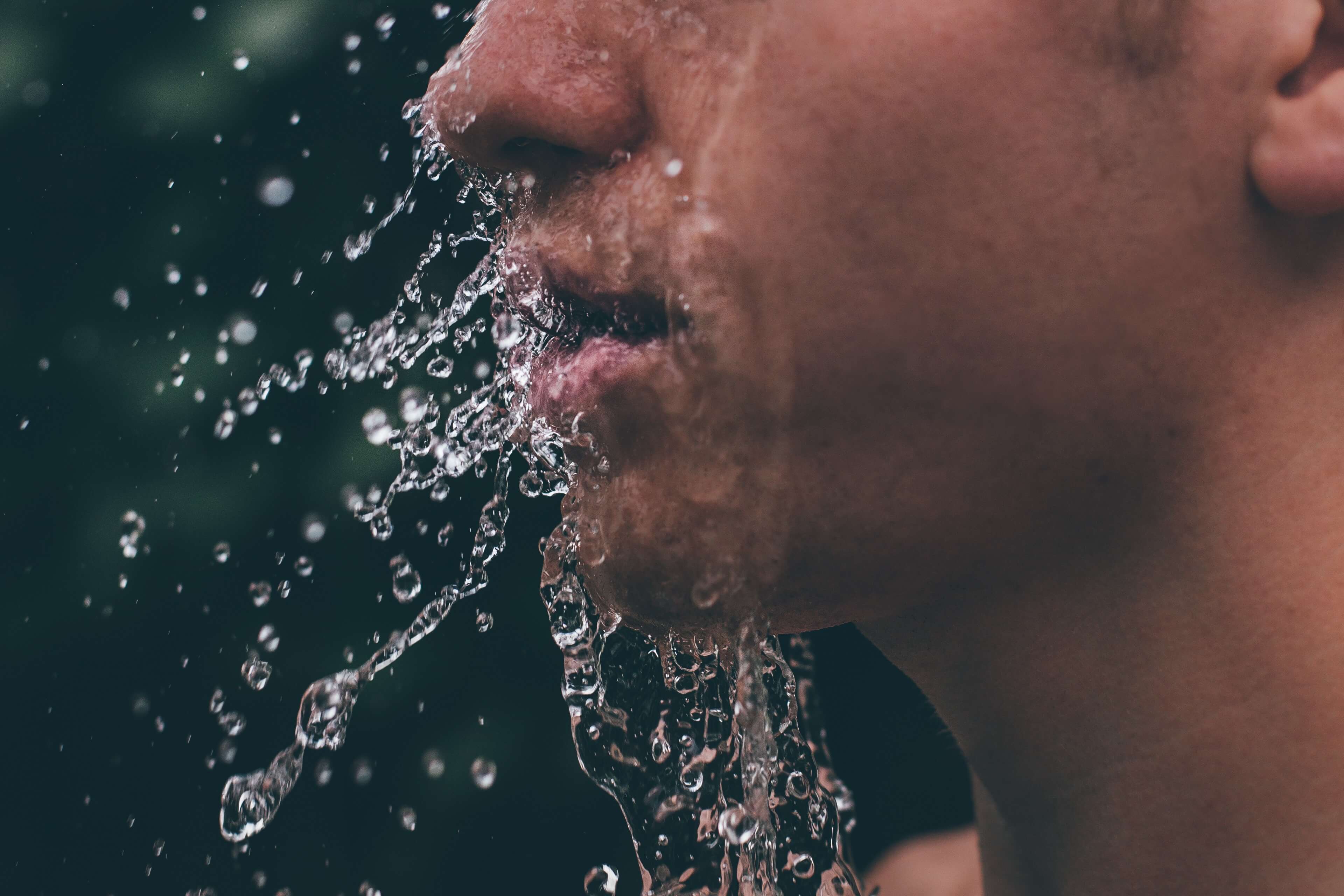 water on face