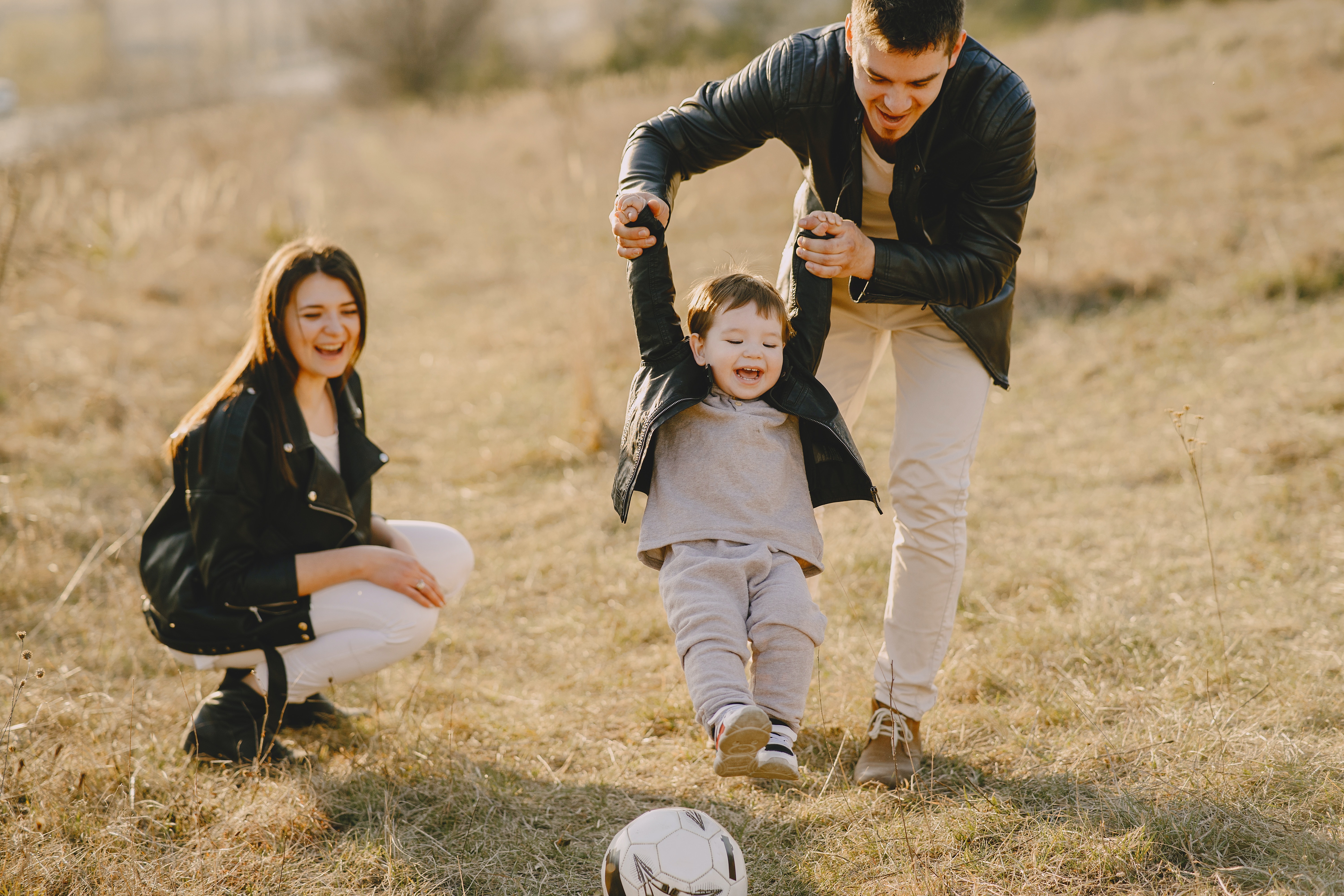 family outside with son