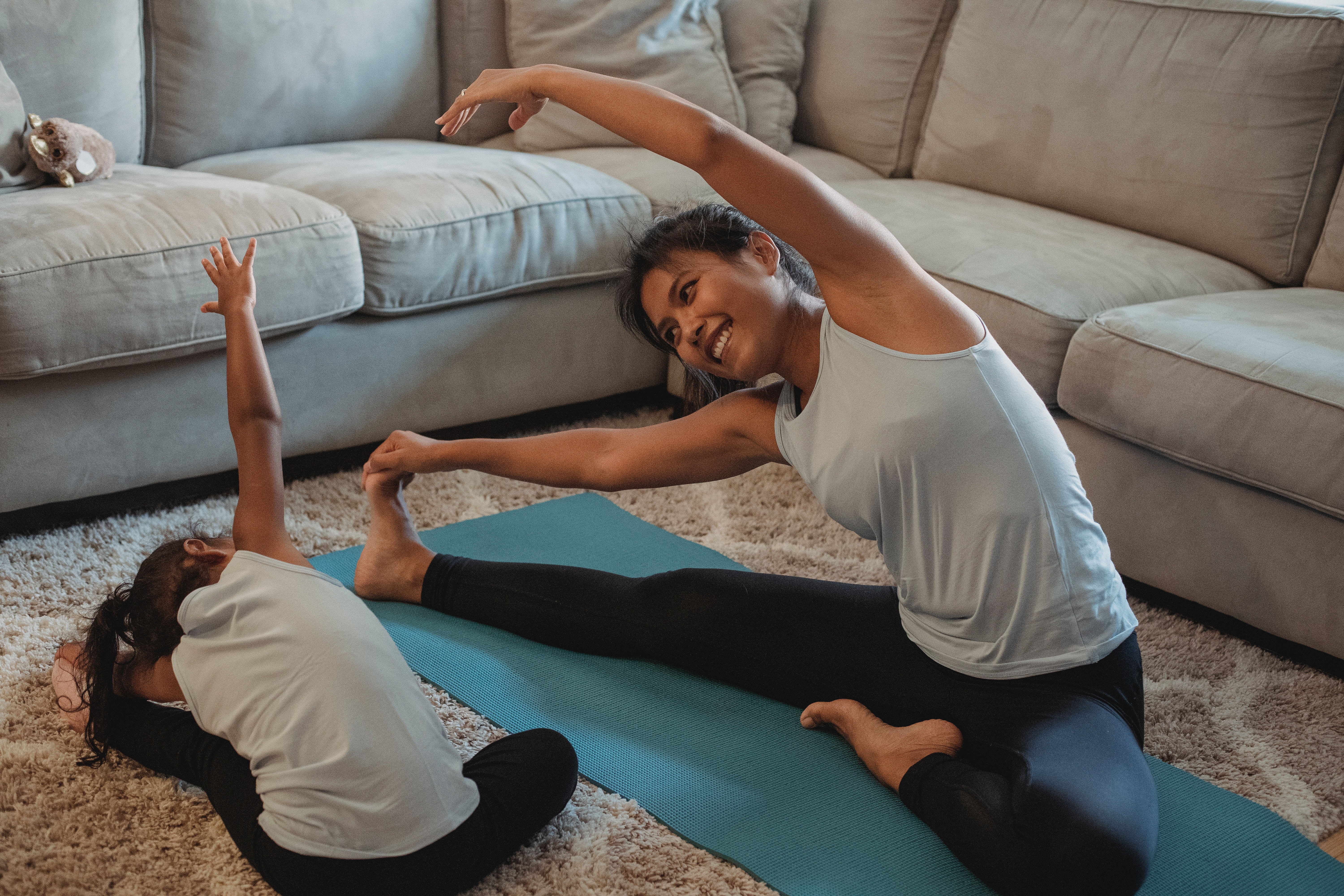 mom and daughter stretching