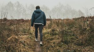 man walking in nature